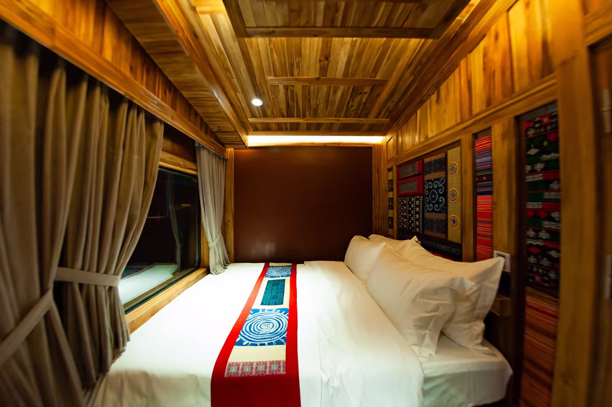 Chapa Express Suite Queen private suite with a queen bed, the most spacious cabin on the train
