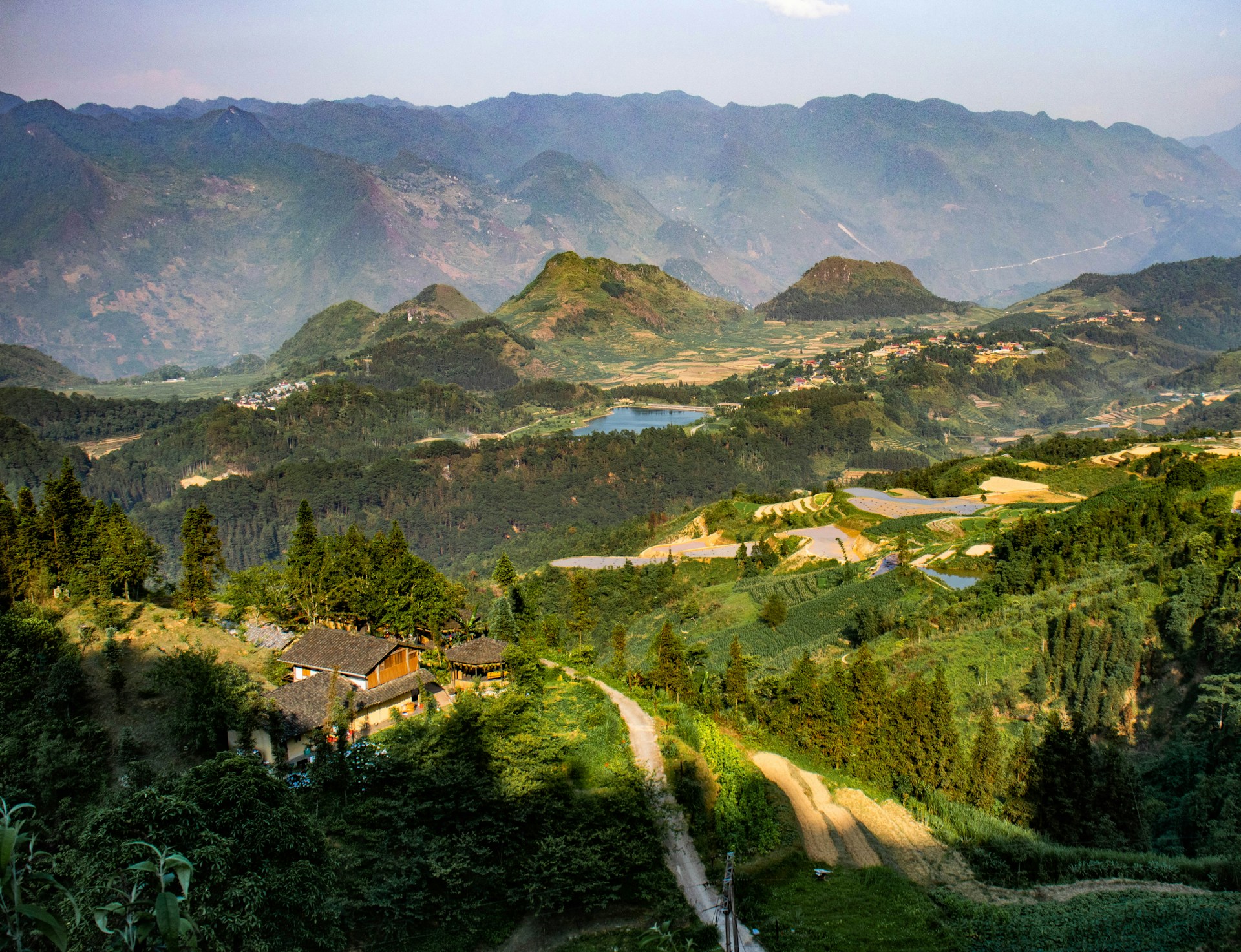 A winding mountain road on the Ha Giang Loop, a classic backpacker route in northern Vietnam