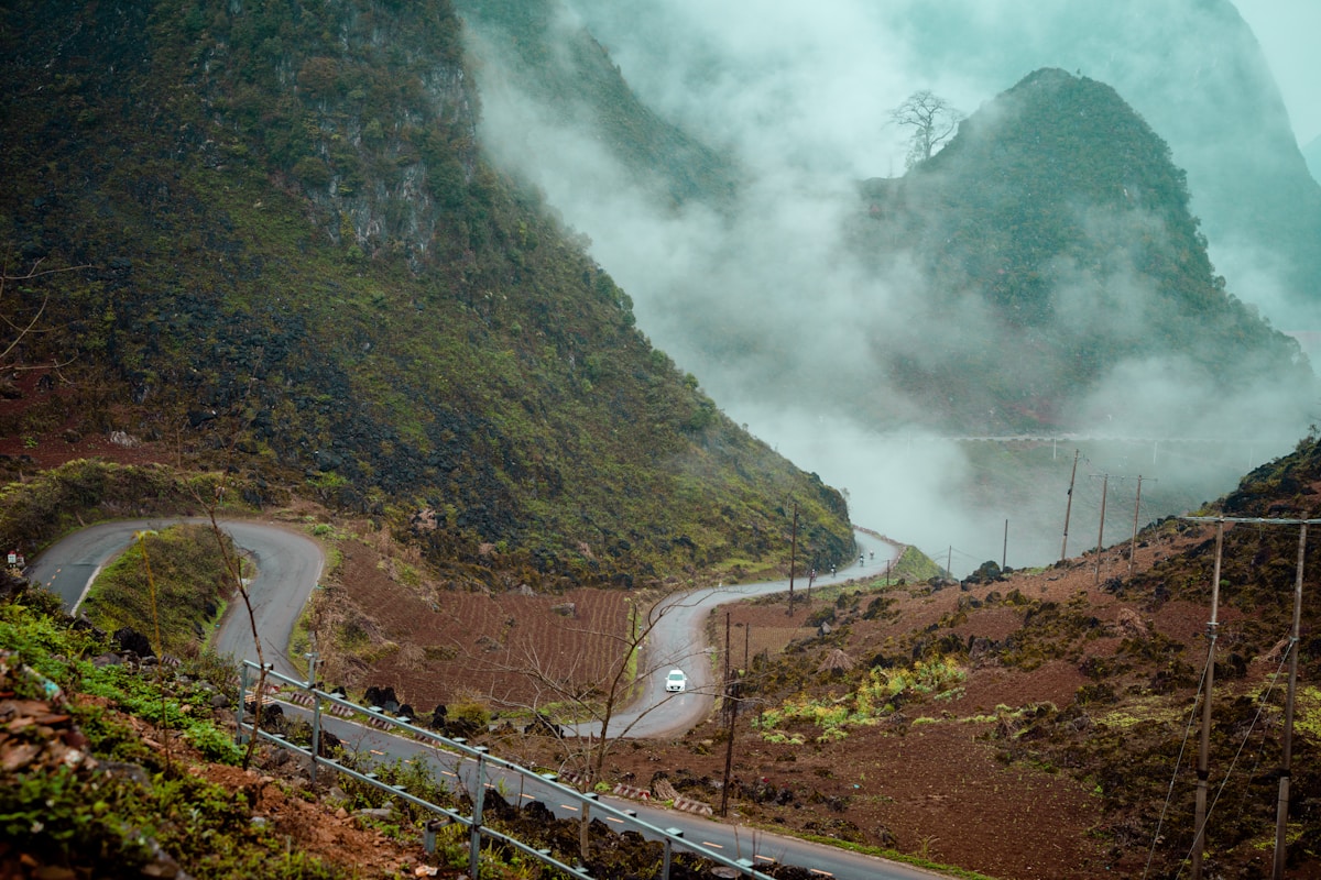 Ha Giang Loop winding mountain road in fog — safety guide