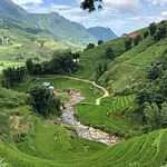 Muong Hoa Valley panorama with the river running through the floor and rice field terraces climbing up both hillsides, Sapa, Vietnam