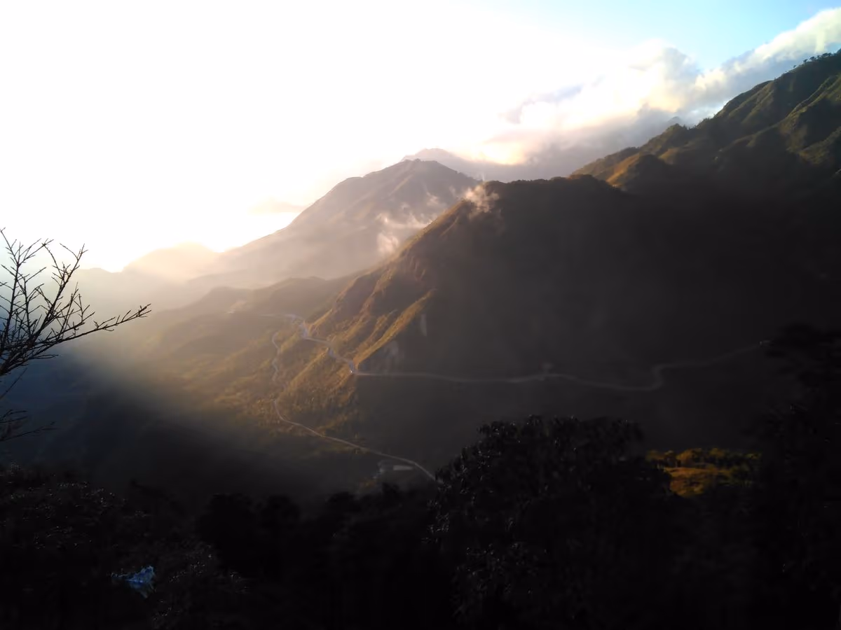 Sunset light over the ridges of O Quy Ho Pass between Sapa and Lai Chau