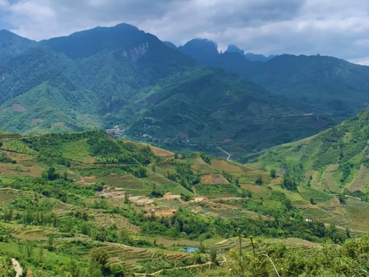 Red Dao women in traditional red headdress near Ta Phin village Sapa