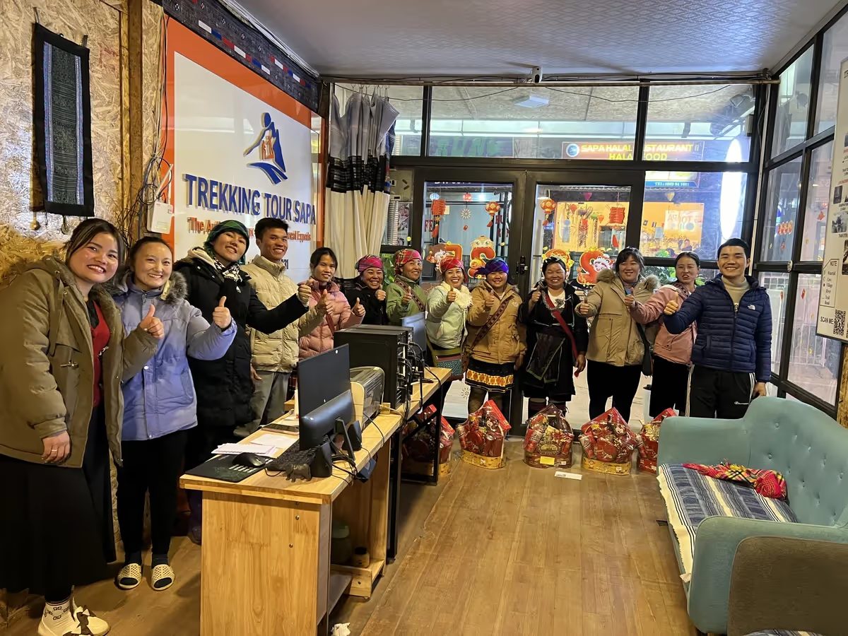 The Trekking Tour Sapa team of local Black H'mong guides and staff at the office in Sapa