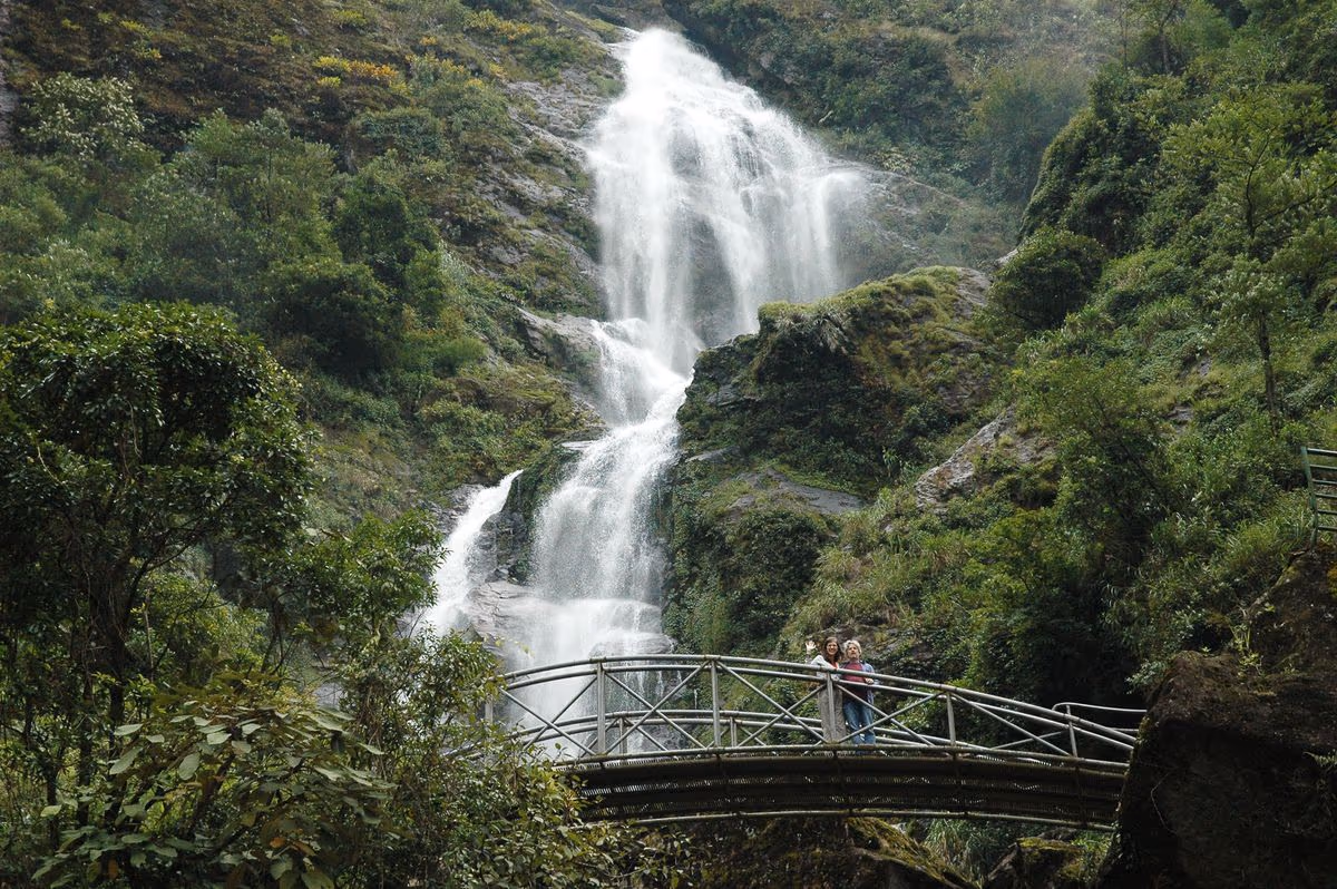 Silver Waterfall (Thac Bac) and its footbridge beside the road to O Quy Ho Pass, Sapa