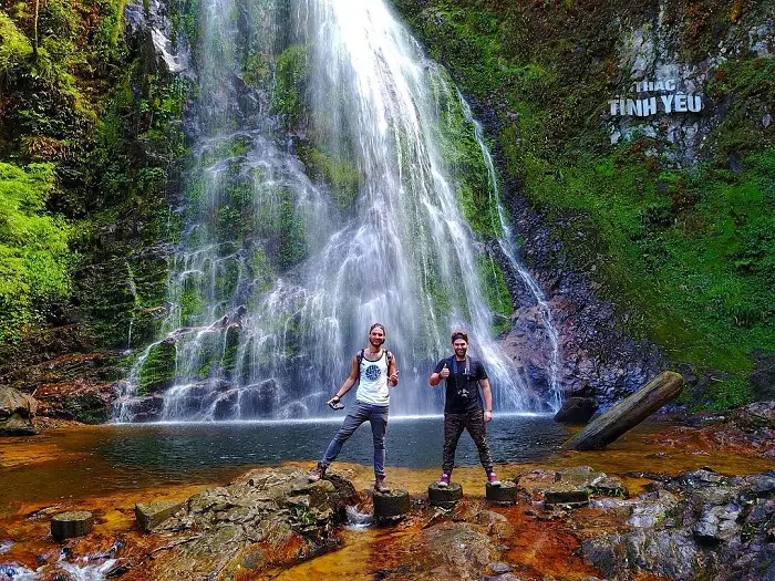 Travelers at Love Waterfall in Hoang Lien forest on the Sapa Waterfalls and Traditional Villages tour