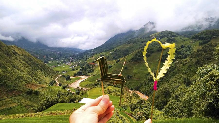 Take photo with horse and heart, made by Hmong's women