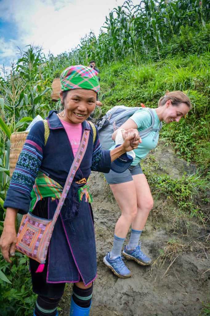 Hmong women helps you while trekking