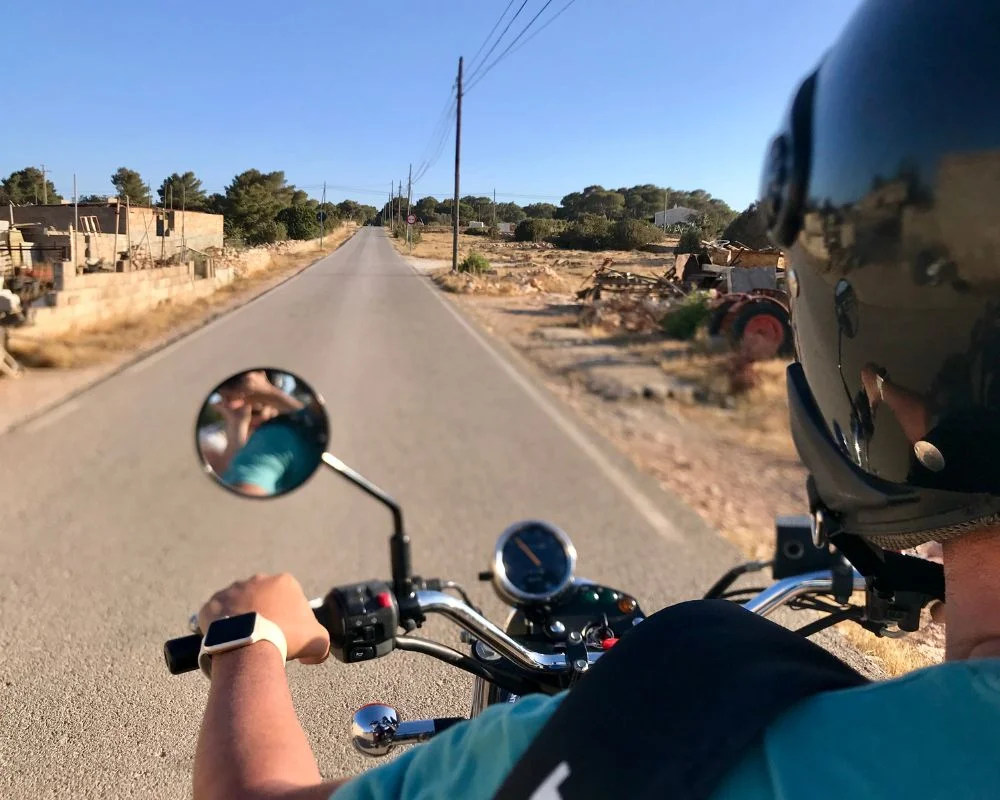 a man is riding a motorbike