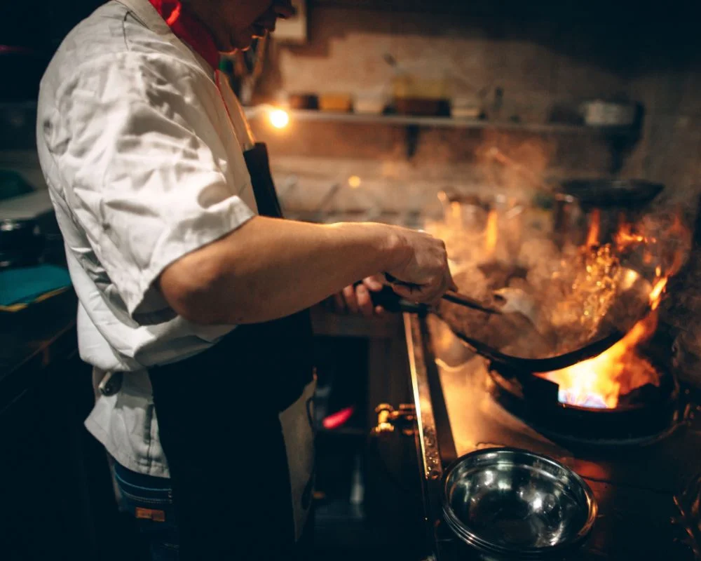 Man Is Cooking Food